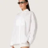 Camisas oversize de mujer en algodón blanco con detalle plisado y botones de joyería