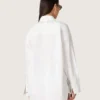 Camisas oversize de mujer en algodón blanco con detalle plisado y botones de joyería