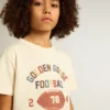 Camisas para niños en blanco desgastado con letras multicolores