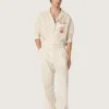 Pantalones de chándal unisex de algodón y lino a rayas en tonos crudo y arena