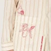 Camisas unisex de algodón y lino a rayas en tonos crudo y arena con bordados
