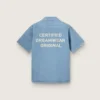 Camisas unisex de denim azul claro con bordado en la espalda