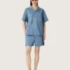 Camisas unisex de denim azul claro con bordado en la espalda