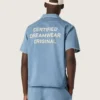 Camisas unisex de denim azul claro con bordado en la espalda