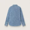 Camisas unisex «Journey» de cambray de algodón azul claro con bajo con flecos y parche bordado