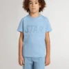 Camiseta azul claro para niños con estampado