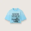Camiseta corta de mujer en jersey de algodón azul claro con estampado gráfico