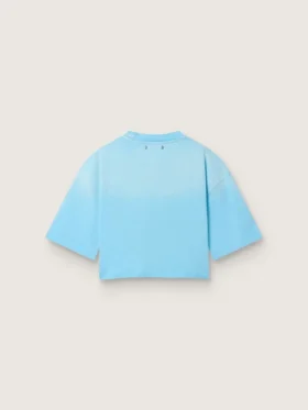 Camiseta corta de mujer en jersey de algodón azul claro con estampado gráfico
