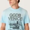 Camiseta de hombre de jersey de algodón azul claro con estampado gráfico