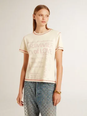 Camiseta de mujer color crema con detalles en rojo descolorido