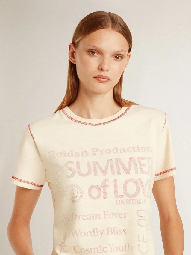 Camiseta de mujer color crema con detalles en rojo descolorido
