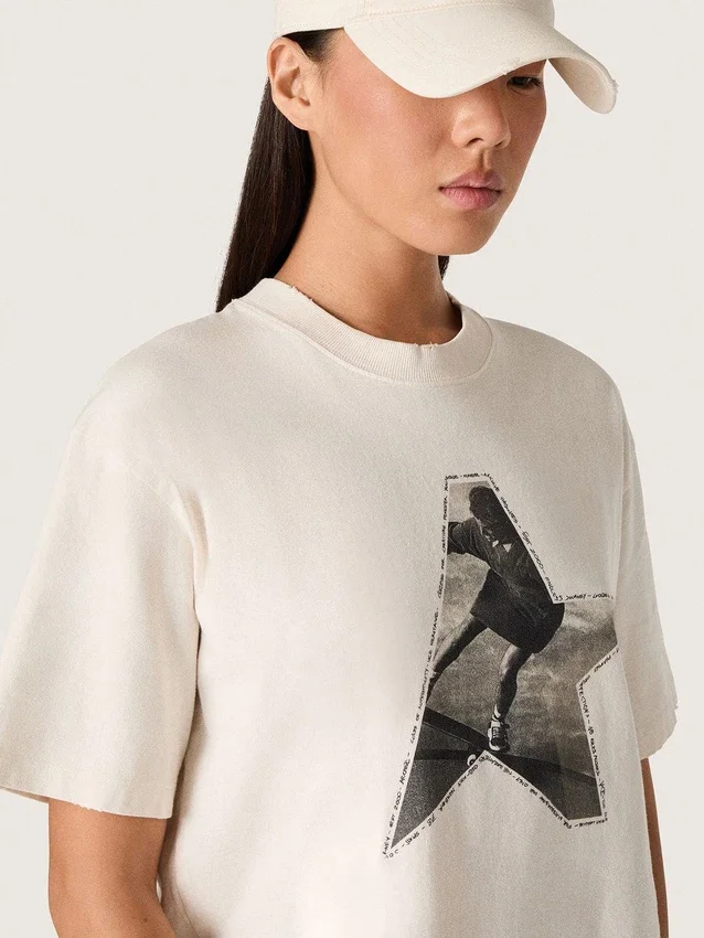 Camiseta de mujer de jersey de algodón blanco con estampado de estrellas