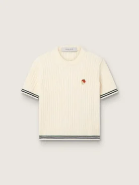 Camiseta de punto blanca para mujer con ribetes en contraste y broche extraíble