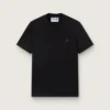 Camiseta negra de la Star Collection con una estrella tono sobre tono en la parte delantera