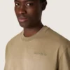 Camiseta unisex de jersey de algodón beige con logotipo bordado