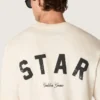 Camiseta unisex «Star» de algodón en blanco vintage con estampado negro en la espalda