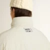 Chaqueta acolchada de color crema para mujer
