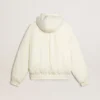 Chaqueta acolchada de color crema para mujer