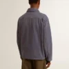 Chaqueta azul de hombre de algodón vaquero con acabado desgastado