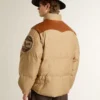 Chaqueta bomber beige con detalles de piel y parches