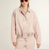 Chaqueta bomber de denim teñida de rosa para mujer