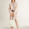Chaqueta bomber de denim teñida de rosa para mujer