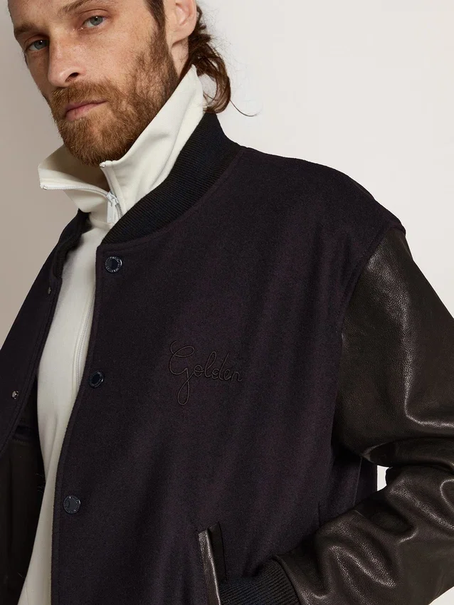 Chaqueta bomber de hombre de lana azul oscuro con mangas de cuero