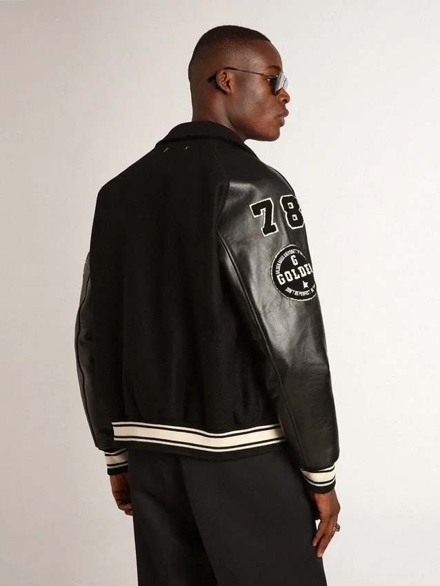 Chaqueta bomber de lana negra con parche