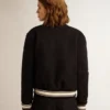 Chaqueta bomber de mujer de lana azul oscuro con detalles en blanco