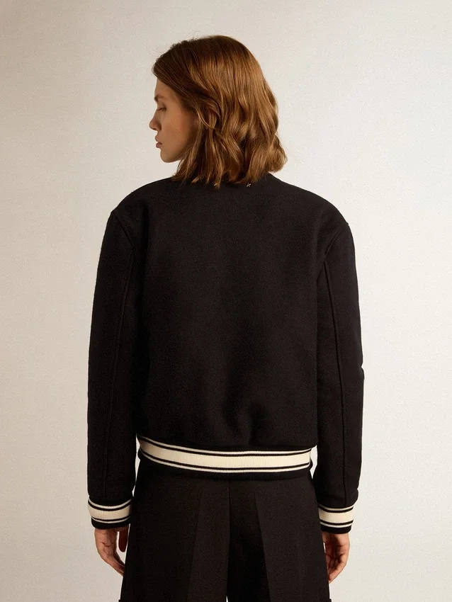 Chaqueta bomber de mujer de lana azul oscuro con detalles en blanco