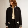Chaqueta bomber de mujer de lana azul oscuro con detalles en blanco