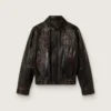 Chaqueta bomber de mujer en piel napa burdeos oscuro con bordados florales