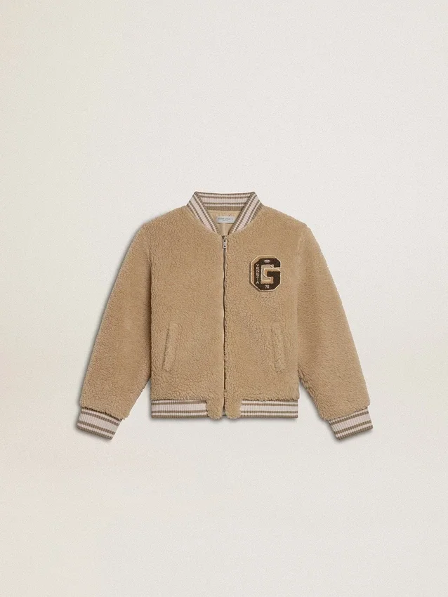 Chaqueta bomber infantil de forro polar en color beige
