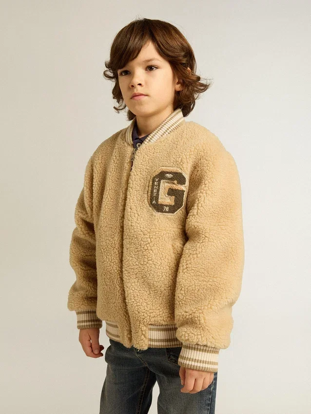 Chaqueta bomber infantil de forro polar en color beige
