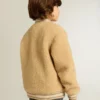 Chaqueta bomber infantil de forro polar en color beige