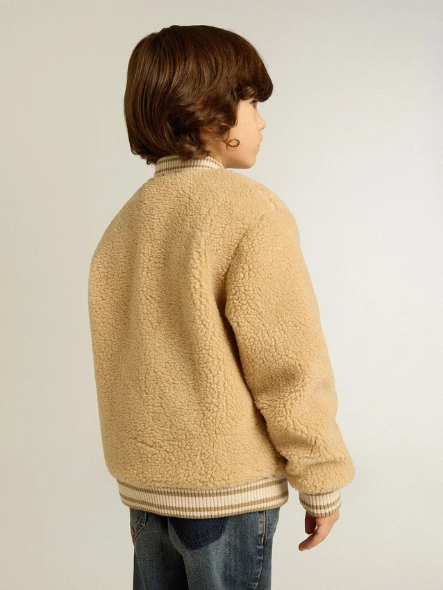 Chaqueta bomber infantil de forro polar en color beige