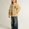 Chaqueta bomber infantil de forro polar en color beige
