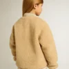 Chaqueta bomber infantil de forro polar en color beige