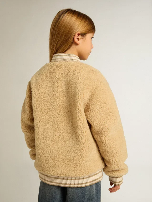 Chaqueta bomber infantil de forro polar en color beige