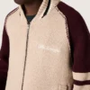 Chaqueta bomber unisex en punto jacquard blanco y burdeos