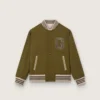 Chaqueta bomber unisex Journey en sarga de nailon verde militar con parche bordado