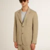 Chaqueta de hombre de corte oversize, de un solo pecho y con rayas finas en color beige