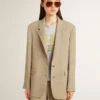 Chaqueta de mujer de corte sencillo con rayas finas en color beige y corte oversize