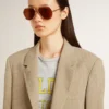 Chaqueta de mujer de corte sencillo con rayas finas en color beige y corte oversize