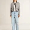 Chaqueta de mujer de lana y seda gris con ribetes de ante negro