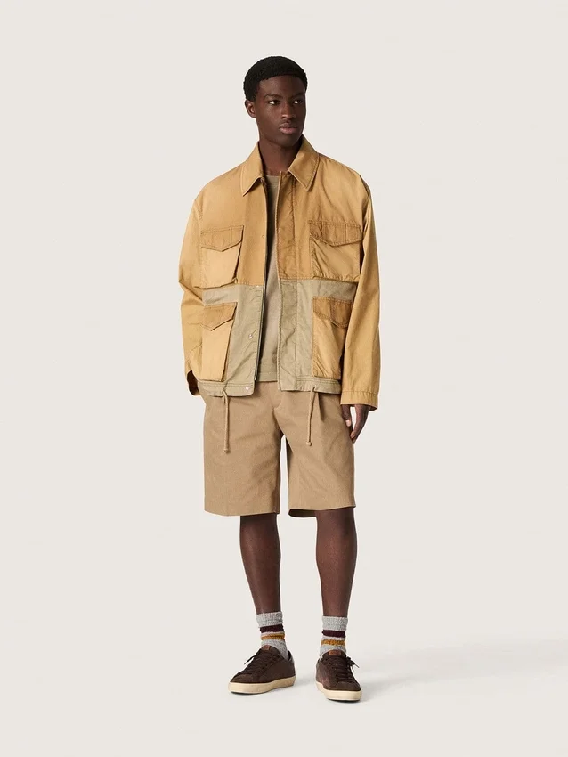 Chaqueta safari unisex de algodón en tonos beige y verde militar con bolsillos extragrandes