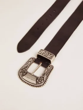 Cinturón de mujer de piel negra con hebilla decorada en color plateado