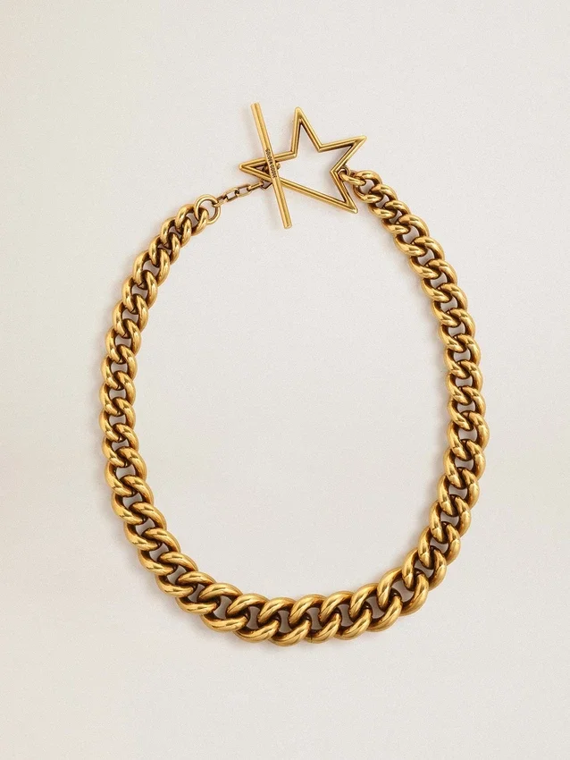 Collar de cadena escalonada en oro antiguo con cierre en forma de estrella