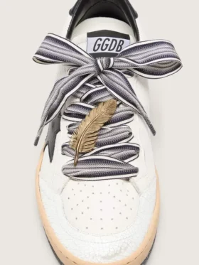 Cordones a rayas «Pieles» con colgante de pluma dorada