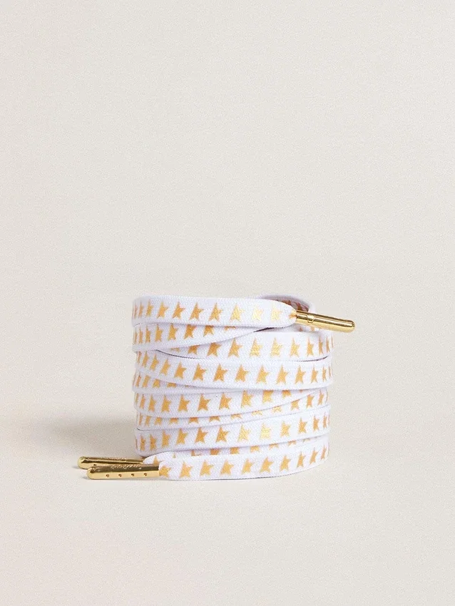 Cordones de algodón blanco con estrellas doradas en contraste